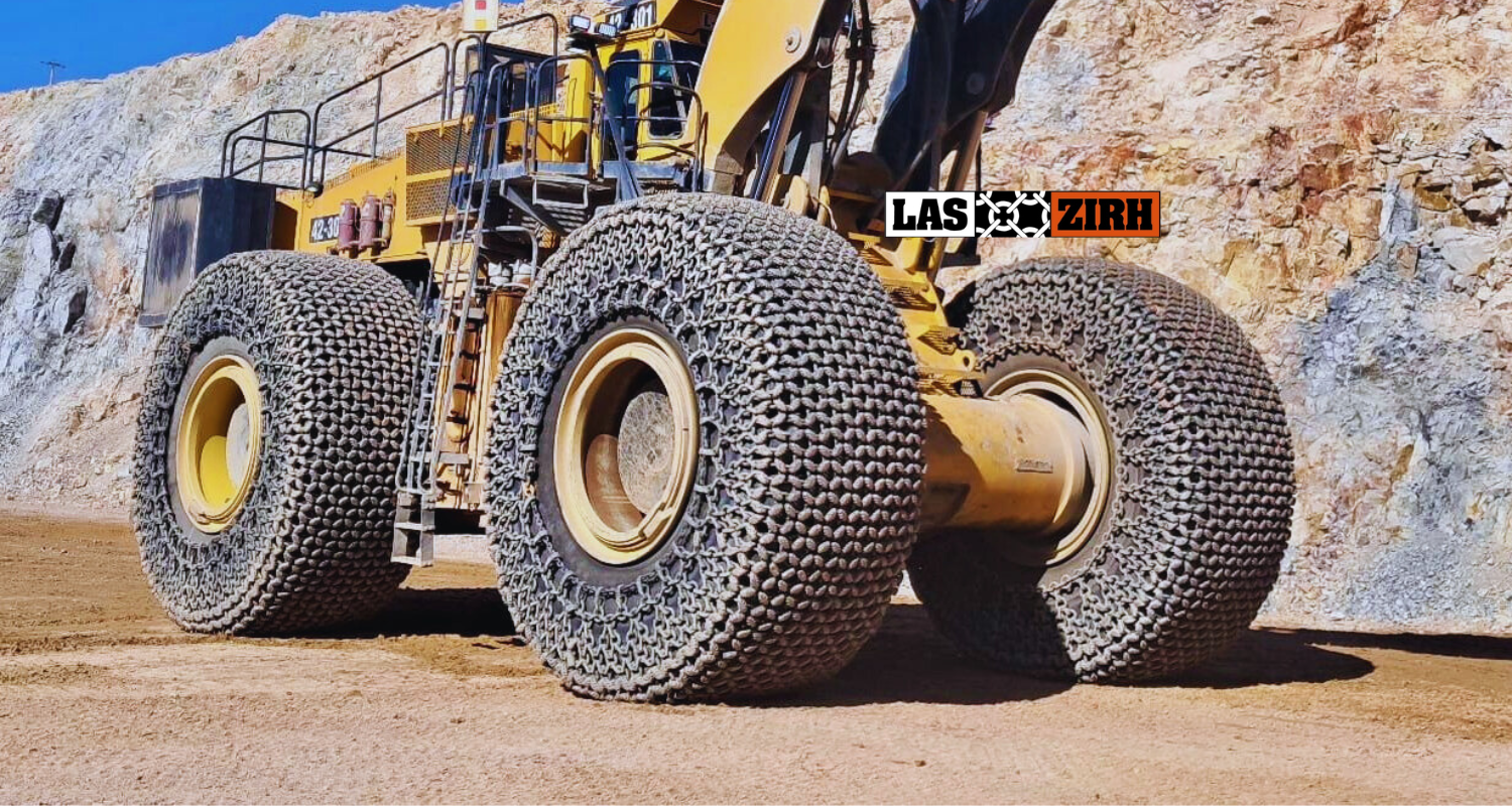 Superb Tyres - Las Zirh Protection Chains - Chains installed on front loader at construction site Superb Tyres - Las Zirh Protection Chains - Chains installed on front loader at construction site
